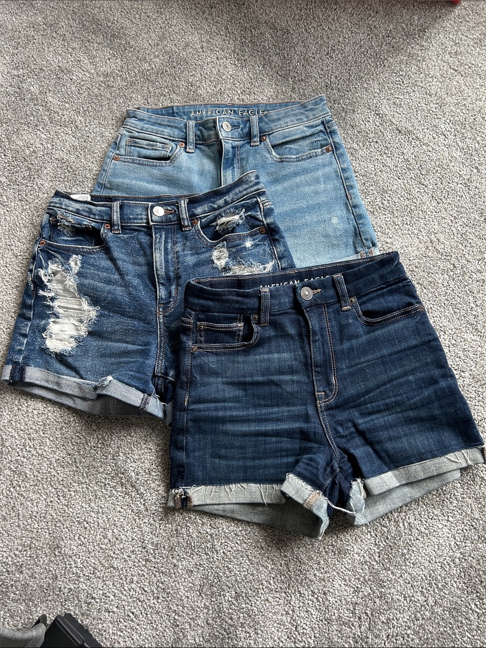 Three pairs of American eagle shorts